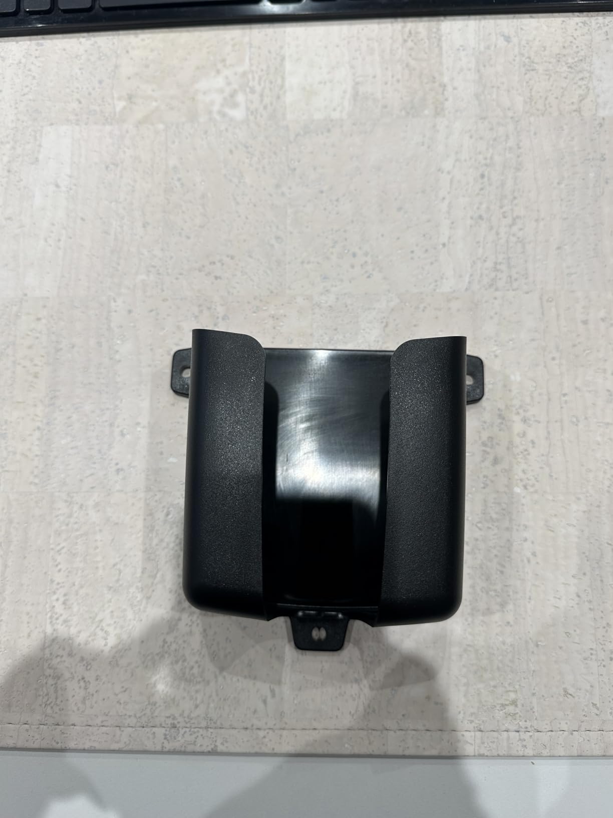 Keeps charger off the floor